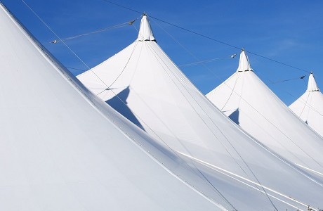 4 marquees in a line representing event cancellation insurance