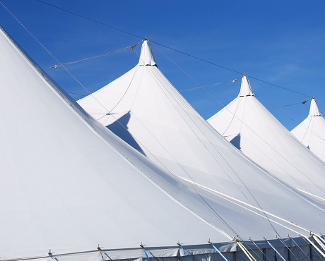 4 marquees in a line representing event cancellation insurance