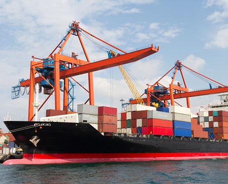 ship being loaded with marine cargo representing marine cargo insurance