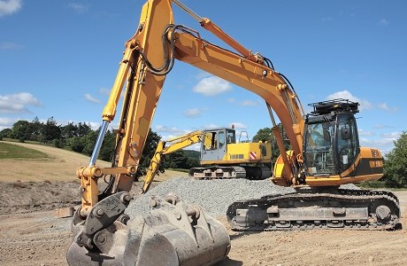 2 commercial earth moving machines representing plant insurance