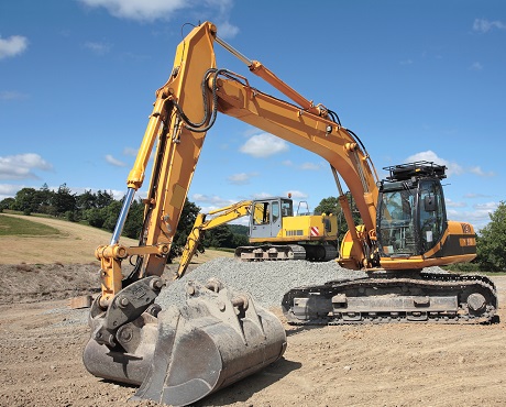 2 commercial earth moving machines representing plant insurance